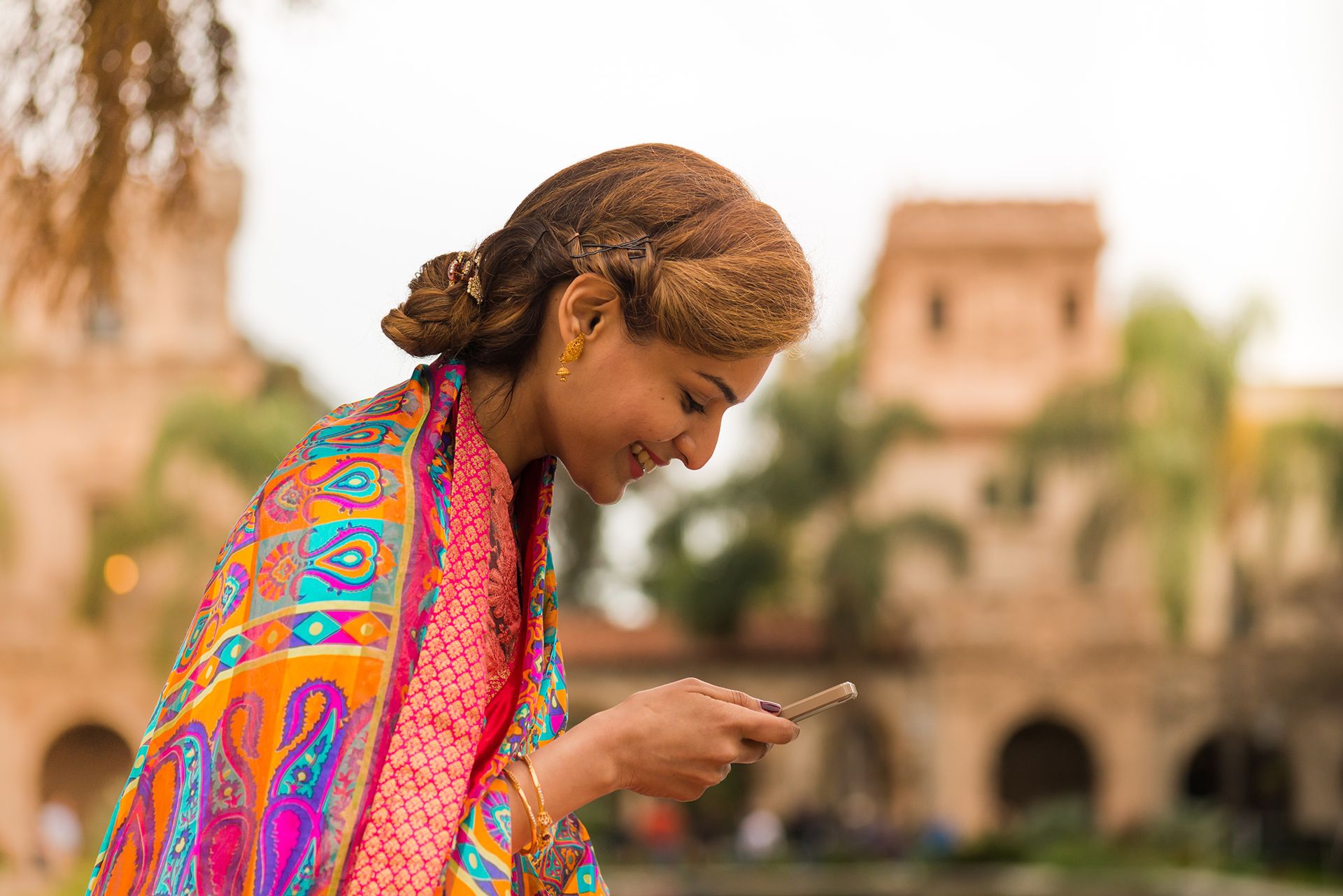 South Asian women texting